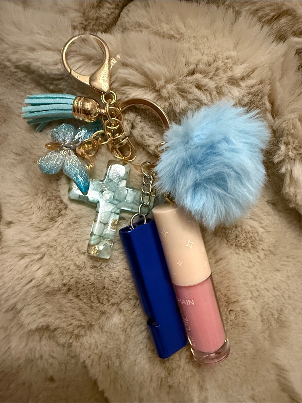 Keychain- Gold-Tone Butterfly & Marble Cross Keychain Charm with Pom Pom - Picture 6 of 6